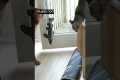 Dog learns to use the door (and